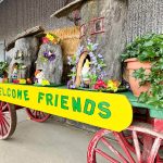 Welcome Friends sign and tractor with crafts